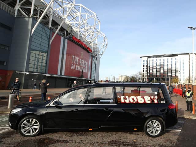 Nobby Stiles' funeral cortege drives past Manchester United's Old Trafford ground