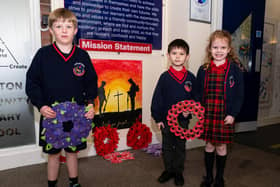 Pupils from Tarleton Community Primary School with their hand-made wreaths. Photo: Kelvin Stuttard