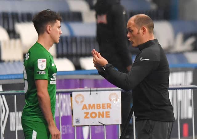 Preston North End's Manager Alex Neil gives instructions to substitute Josh Harropduring