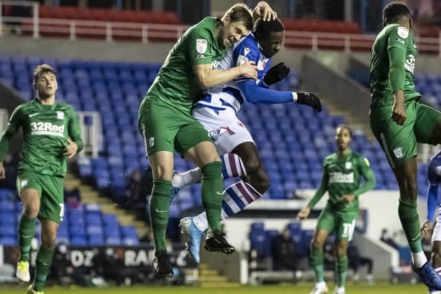 PNE's Paul Huntington gets up high against Reading