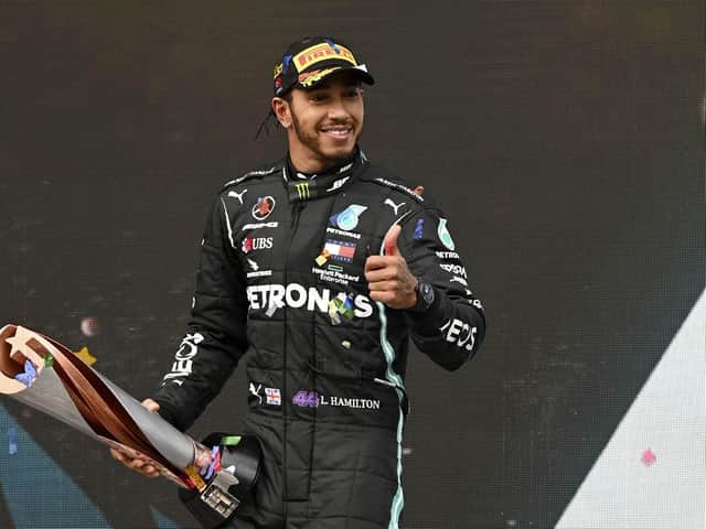 Lewis Hamilton on the winner's podium at the Turkish Grand Prix