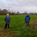 Cllr Alan Whittaker and Eccleston resident Geoff Bury at the site of the proposed Redrow development in the village