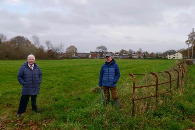 Cllr Alan Whittaker and Eccleston resident Geoff Bury at the site of the proposed Redrow development in the village