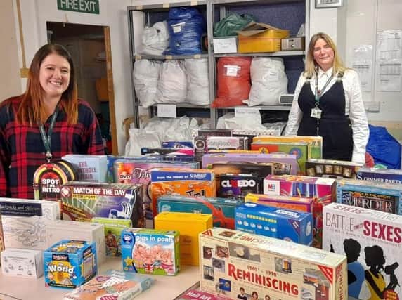 St John's Hospice in Lancaster has expanded its online shopping platforms on ebay and Facebook during the Covid-19 pandemic. Pictured are Leanne Hunter, e-commerce co-ordinator and Zosia Muhler, e-commerce assistant with some of the goods for sale online.