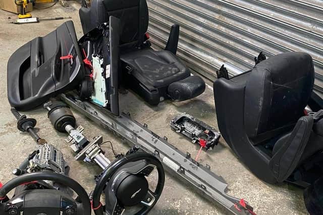Inside the chop shop – a place where stolen vehicles are dismantled for their parts – officers found parts for Jaguars, BMWs, Porsches and Mercedes.