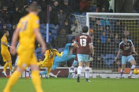 Daniel Johnson scores Preston's second goal against Burnley at Turf Moor in December 2015
