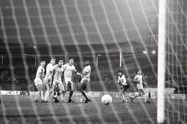 Willie Naughton fires a free-kick goalwards in PNE's 4-3 win over Bury in the FA Cup