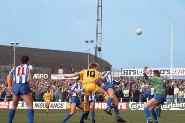 Preston's Mark Patterson gets up for a header against Whitley Bay