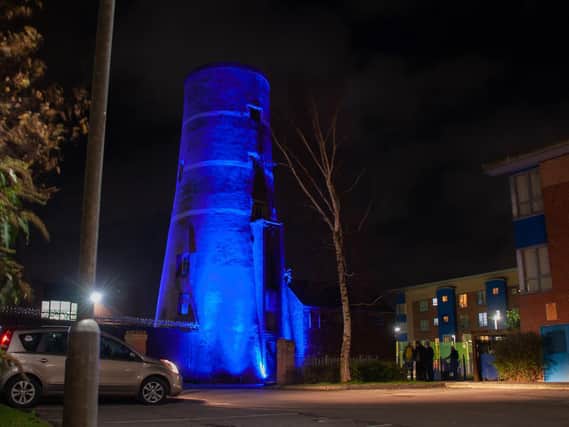 The Cragg's Row mill was lit up in blue to remember three-year-old Carson. Photo by Mark McLoughlin.