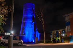 The Cragg's Row mill was lit up in blue to remember three-year-old Carson. Photo by Mark McLoughlin.