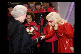 Queen Elizabeth II meets American singer Lady Gaga following the Royal Variety Performance in Blackpool on December 7, 2009