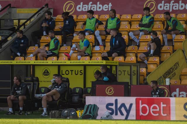Preston North End substitutes watch the game against Norwich at Carrow Road
