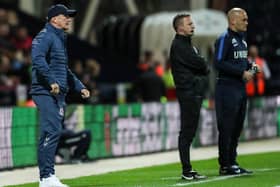 Tony Pulis and Alex Neil on the Deepdale touchline during Preston North End's Carabo Cup clash with Middlesbrough in 2018