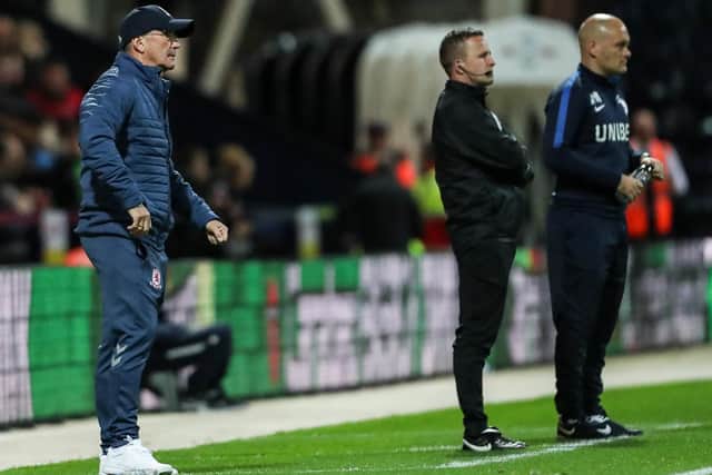 Tony Pulis and Alex Neil on the Deepdale touchline during Preston North End's Carabo Cup clash with Middlesbrough in 2018
