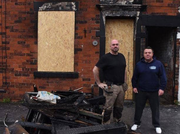 Local tradesman David Hardman (left), of Hardman Electrical Services, and Andy Wilson, of Bob Wilson TV & Satellite Aerial Engineers, used their works ladder to rescue the family from the upstairs window as the fire raged below