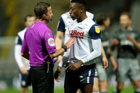 Darnell Fisher talks to referee David Webb at the final whistle of the victory over Sheffield Wednesday