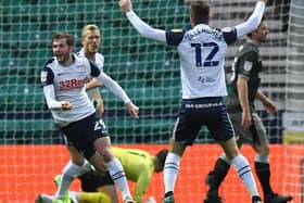 Tom Barkhuizen turns to celebrate scoring Preston North End's winner against Sheffield Wednesday, watched by a delighted Paul Gallagher
