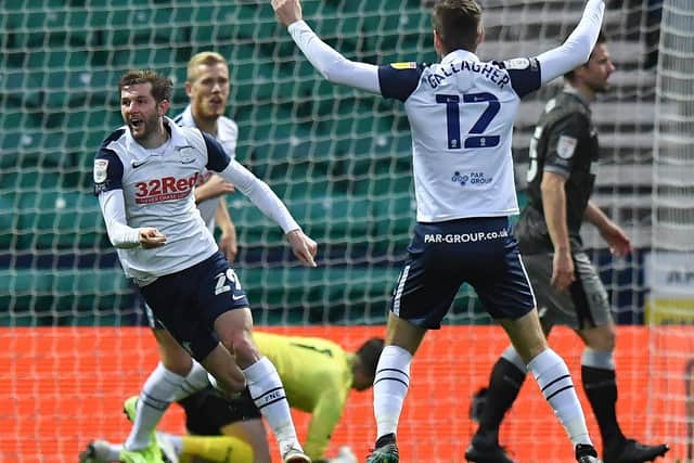 Tom Barkhuizen turns to celebrate scoring Preston North End's winner against Sheffield Wednesday, watched by a delighted Paul Gallagher