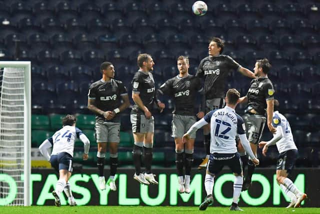 Preston North End midfidler Paul Gallagher sends a free-kick over the Sheffield Wednesday wall at Deepdale