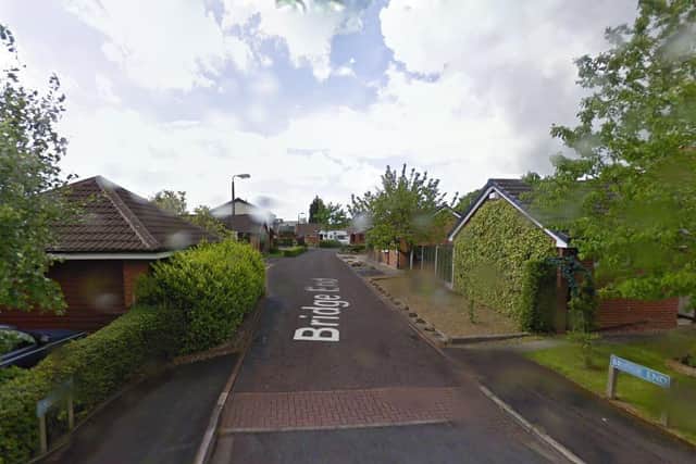 The fire service were called to Bridge End in Lostock Hall on Monday morning (November 23) after a vehicle crashed into a garage. Pic: Google