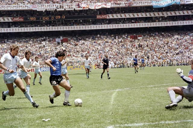 Maradona scores the second Argentina goal against England in 1986
