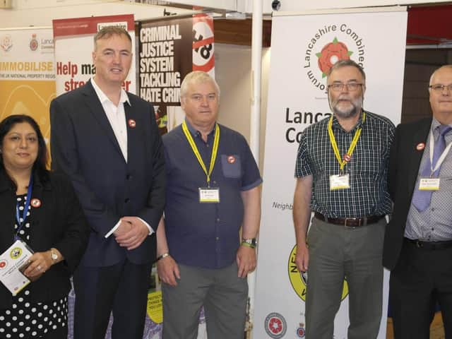Lancashire's Police and Crime Commissioner Clive Grunshaw (second from left) and Colm Flaherty (second from right) at the Neighbourhood Watch promotion day