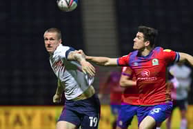Preston striker Emil Riis tussles with Blackbrun skippere Darragh Lenihan