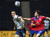 Preston striker Emil Riis tussles with Blackbrun skippere Darragh Lenihan