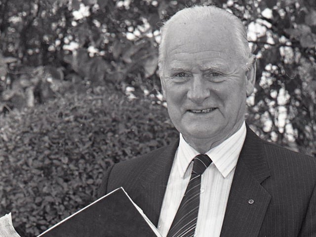 Tom Finney receives his big red book for appearing on This Is Your Life
