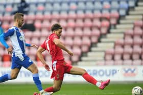 Harry Cardwell slots home against Wigan Athletic in the previous round