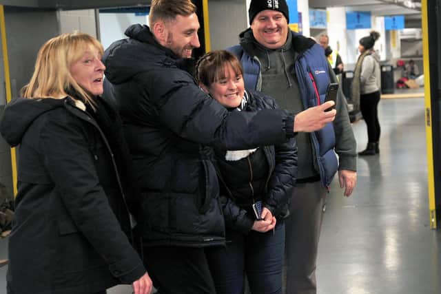 Preston North End striker Louis Moult takes a selifie with fans at the Big Sleep Out charity event