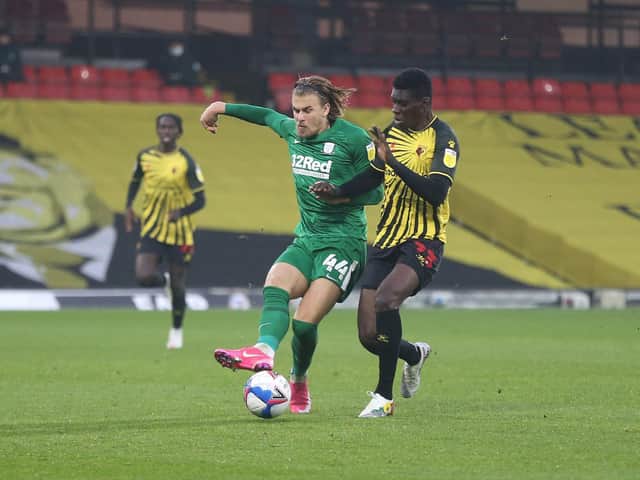 Brad Potts shields the ball from Ismaila Sarr