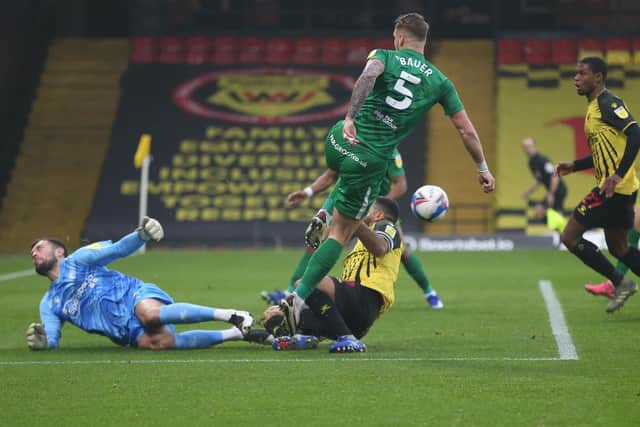 North End defender Patrick Bauer sees his shot blocked by Watford goalkeeper Ben Foster