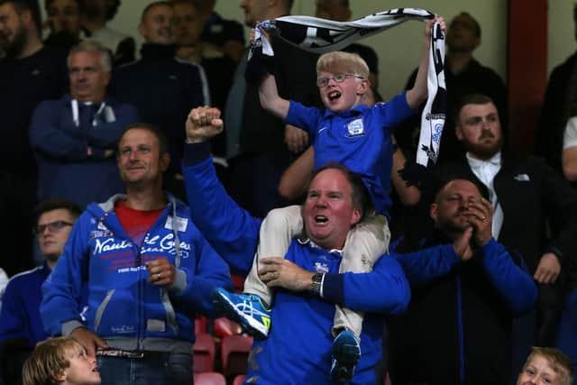 PNE fans celebrate at the final whistle against Bournemouth