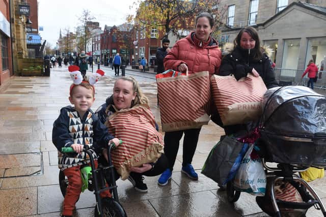 Shoppers from Leyland: Laura Swarbrick, 27, Michelle Beggs, 41 and Stacy Hollinger, 25, with children Lucas 4, and Freya, two months