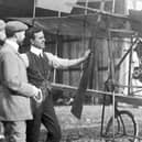 Mr Roe (right) and his triplane with Aviation Pioneer Henri Farman