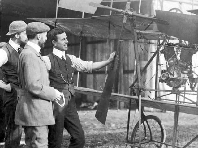 Mr Roe (right) and his triplane with Aviation Pioneer Henri Farman
