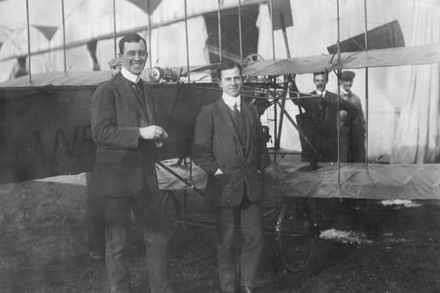 Humphrey Roe (left) and his brother Mr A. V. Roe (right) and his triplane at Squires Gate airport Blackpool, 1909