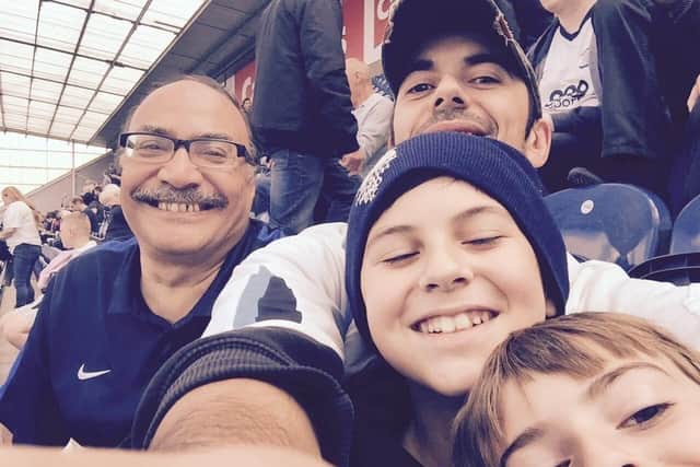 Mr Mortimer attending a PNE game with son Paul and two of his grandchildren