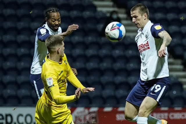 Daniel Johnson and Emil Riis put pressure on the Wycombe defence
