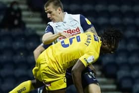 Wycombe Wanderers’ Anthony Stewart tackles North End’s Emil Riis