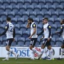 The Preston players celebrate Tom Barkhuizen's opening goal against Wycombe Wanderers at Deepdale