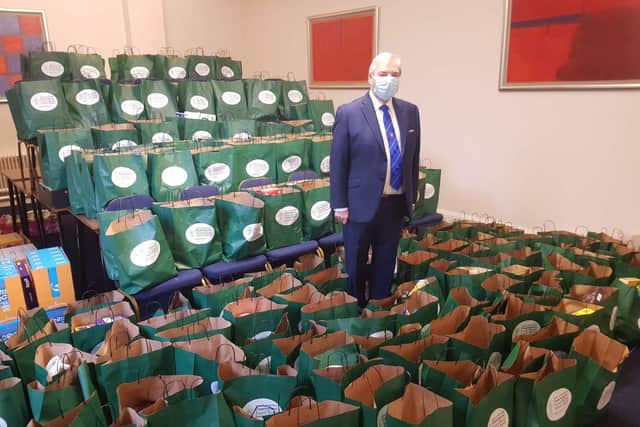 Preston Masonic group chairman Steve Bolton with donations for the West Lancashire Freemasons Food Bank Appeal