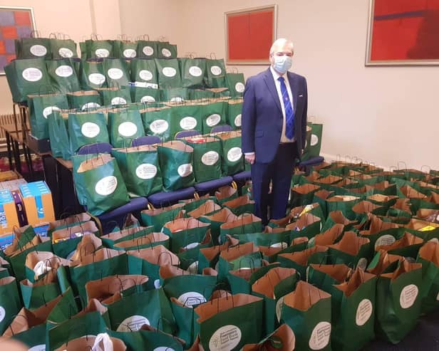 Preston Masonic group chairman Steve Bolton with donations for the West Lancashire Freemasons Food Bank Appeal