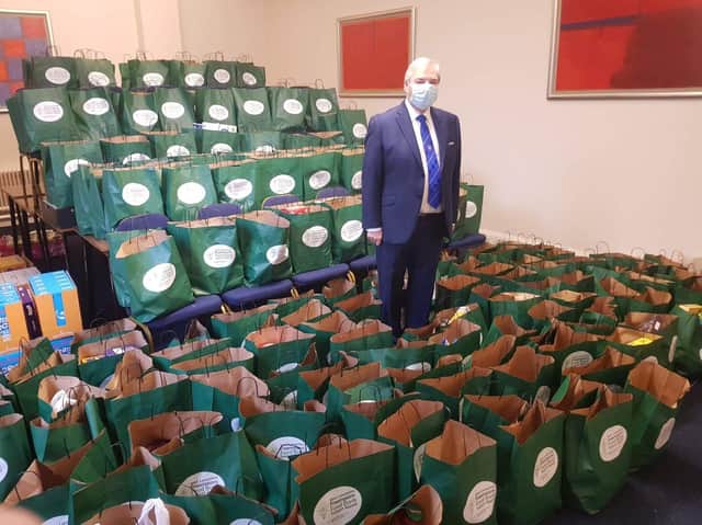 Preston Masonic group chairman Steve Bolton with donations for the West Lancashire Freemasons Food Bank Appeal