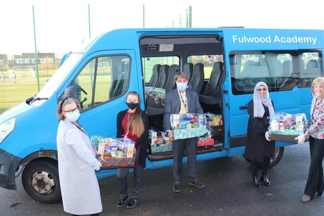 Fulwood Academy headteacher David Lancaster and his staff prepare to deliver  food hampers to almost  100 families