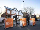 Cabin Crew (left to right) Matteo Lorenzini, Hanna Essemiani and Charlotte Kelson celebrate easyJet's 25th birthday, as the airline launches the world's first inflight trolley service at home