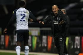 Preston North End manager Alex Neil gives instructions to Darnell Fisher during the win against Middlesbrough at Deepdale