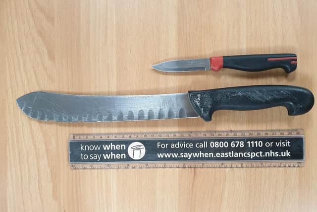 The boy was found to be in possession of two knives hidden in his clothing. (Credit: Lancashire Police)