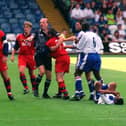 Referee Steve Bennett grabs Preston North End midfielder Michael Appleton before sending him off against Luton in August 1998